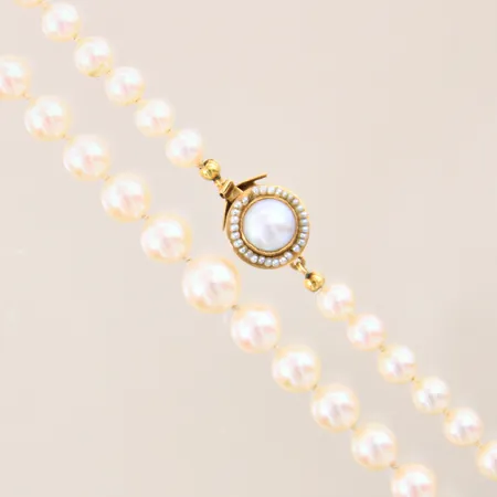 Pärlcollier, doserat, med odlade saltvattenpärlor, guldlås med mabépärla samt orientaliska pärlor, längd 53cm, bredd 5-8mm, pärlor med slitage, 18K, bruttovikt: 28,1g Vikt: 0 g