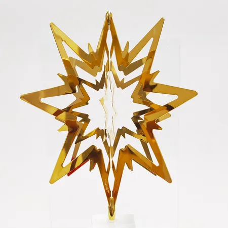 Juldekoration, Georg Jensen, toppstjärna till gran, saknar spiraldel, 19 x 18cm, guldpläterad mässing, i orginalförpackning. 