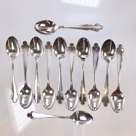 Tolv kaffeskedar modell Disa, 12cm, silver 830/1000 Vikt: 181,2 g