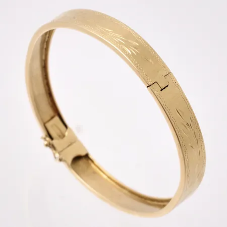 Armring i 18K guld, 19cm, bredd 8mm, vikt 16,51g.
