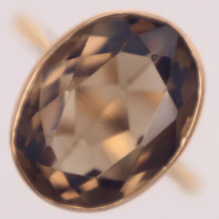 Ring med brun sten, stl 18½, bredd 1,6-16,6mm, ojämnheter i fattning, 14K  Vikt: 3,8 g