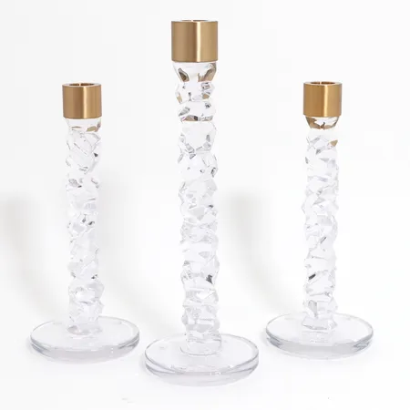 Tre ljusstakar Orrefors Carat, design Lena Bergström, höjd: 24cm, 29,5cm, kristall med mässingsdetaljer, etikettmärkta