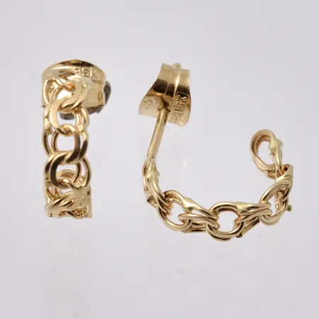 1 par örhängen i 18K guld, mått 3,5x11mm, vikt 1,25g.