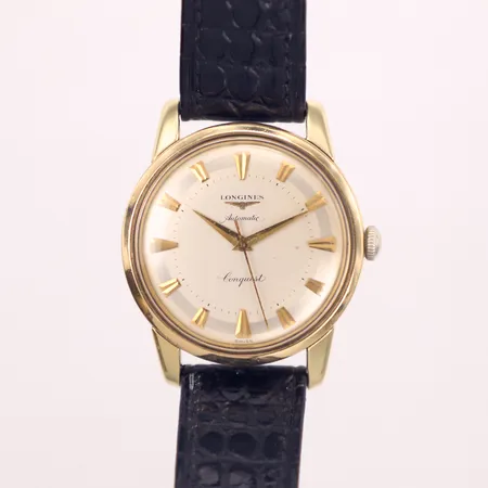 Herrur, Longines Conquest, guldfärgat stål, 35mm, automatisk, refnr 9002 1 108, verknr 9611754, kaliber 19 AS 17 jewels, plexiglas, smuts i urtavla, svart läderband, box