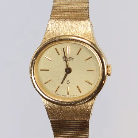 Damur Seiko quartz, Øca20mm, ref 2320-5430, förgyllt stål, integrerat band ca 18cm, säkerhetskedja defekt, ej funktionsestad