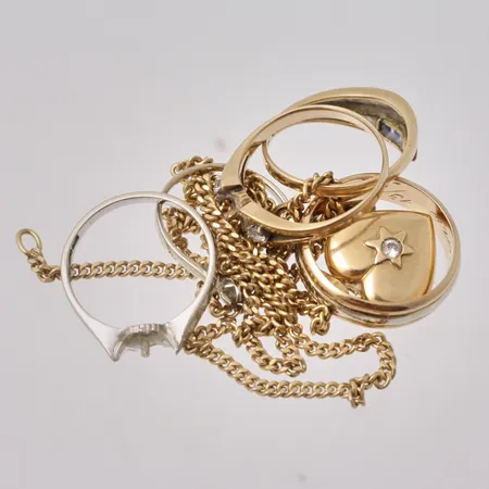Diverse defekt guld, 18K, bruttovikt 21,69, ca nettovikt 21g.