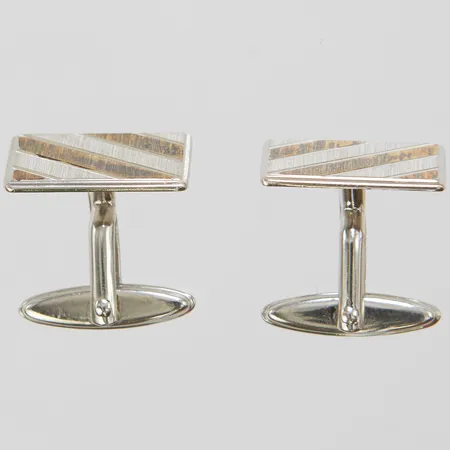 Ett par manschettknappar, 11,4x18mm, tvåfärgade, missfärgningar, silver 925/1000 Vikt: 7,2 g