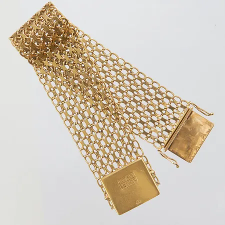 Armband, X-länk, längd: 19cm, bredd: 24,1-24,3mm, lagningar, trögt kistlås, svenska stämplar, 18K Vikt: 35,8 g