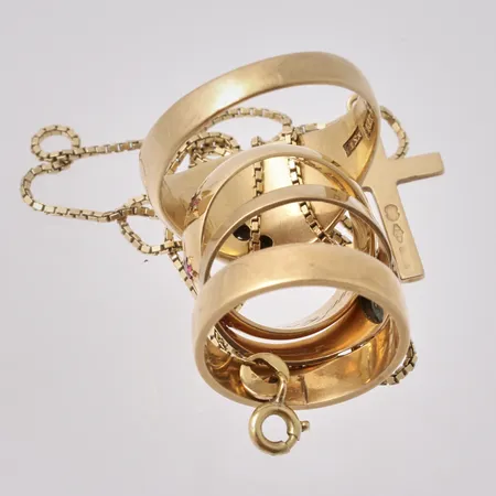 Diverse defekt guld, 18K, vikt 29,22g.