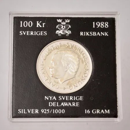 Mynt i silver, Nya Sverige Delaware, 100 Krona år 1988, 925/1000, myntkapsel, vikt 16g. 