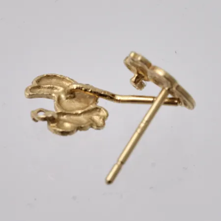 Defekt guld, 18K, vikt 0,5g.