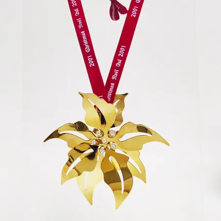 Juldekoration, Georg Jensen, Julmobil 2001, höjd: ca.9cm, guldpläterad mässing, vita stenar, i orginaletui. 