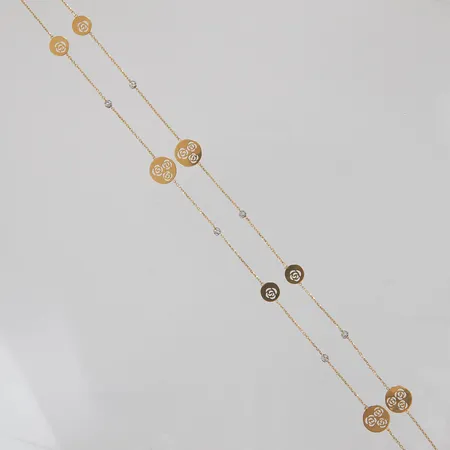 Collier, 80,5cm, Ankarlänk, bredd:1mm, 8 integrerade hängen, vitguld/rödguld, 18K.  Vikt: 5,7 g