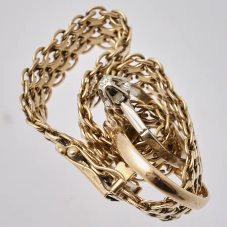 Diverse defekt guld, 18K, vikt 26,3g.