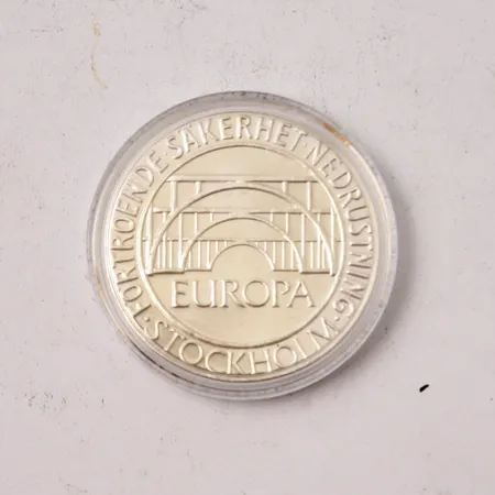 Silvermynt 100KR, Ø32mm, Europa, Förtroende Säkerhet Nedrustning Stockholm, Sverige, 1984, myntkapsel, 925/1000, vikt 16g.