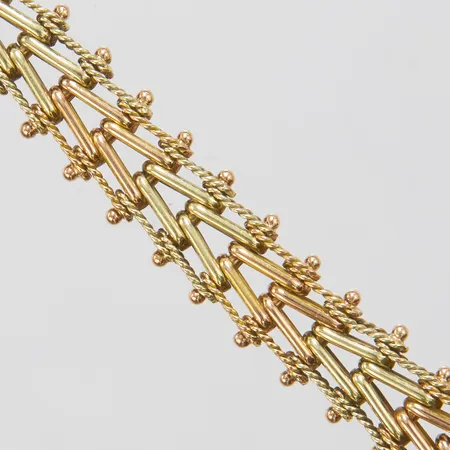 Armband, ledat, längd: 18,3cm, bredd: 10,4-10,7mm, tvåfärgad, ojämnheter på länk, ryska stämplar, 14K Vikt: 21,4 g