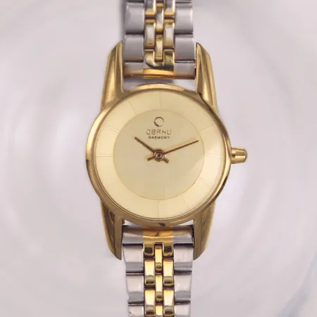 Damur Obaku Harmony, stål, 24mm, quartz, titanglas med smärre repa, boettnr V130LGGRR, design av Lau Liengård Ruge, Danmark, länk i stål med färgbortfall, inga tillbehör 