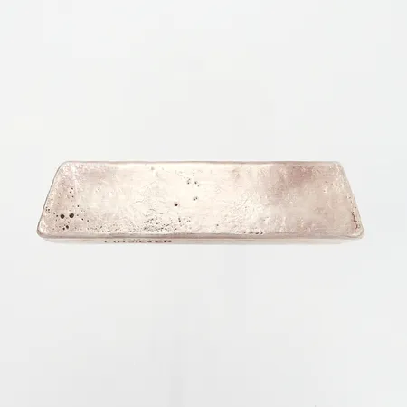 Silvertacka finsilver, märkt "ANA FINSILVER", silver 999/1000 Vikt: 1000,6 g