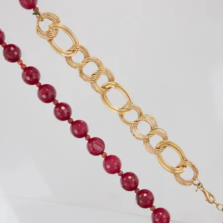 Collier, 60cm, fasetterad, infärgad kvartsit 4-14mm, 18K, nettovikt 16g.  