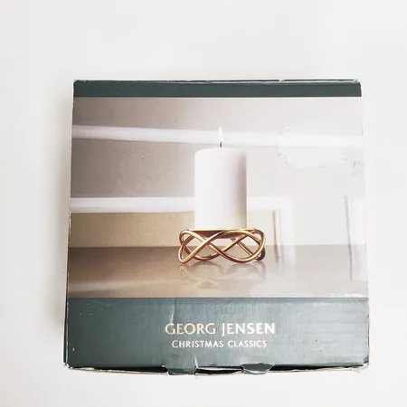 Ljusstake, Georg Jensen Glow, Ø10,5cm, höjd: 3,5cm, guldpläterad mässing, bruksslitage, i orginalförpackning. 