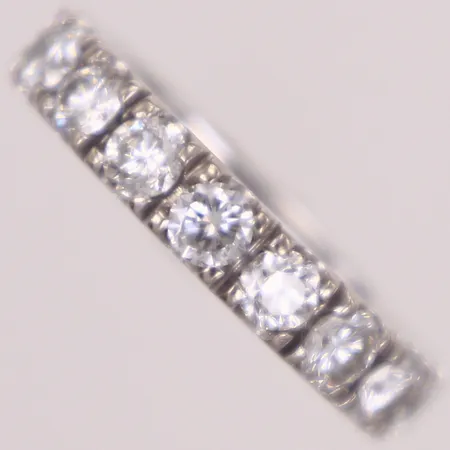 Alliansring med diamanter 17xca0,12ct, ca W(H)/VS-SI, stl 16, bredd: 3,7mm, Stockholms stadsstämpel, vitguld, 18K Vikt: 4,2 g