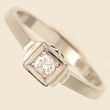 Ring diamant ca 0,10ct, stl 16½, bredd 5mm, vitguld, 18K  Vikt: 3,1 g