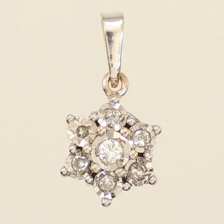 Hänge med diamanter 1x ca 0,03ct, 6x ca 0,01ct, längd 17,5mm inklusive ögla, bredd 8,7mm, vitguld, 18K  Vikt: 1,3 g