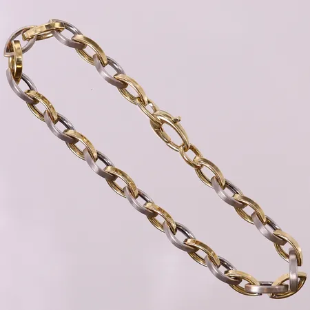 Armband tvåfärgad, ca 19cm, bredd 5mm, GHA. 18K Vikt: 7,2 g