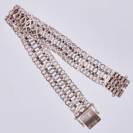 Armband, längd ca 18,5cm, bredd ca 13mm, Sahlgrens Guldsmide år 1975, silver 925/1000  Vikt: 18,3 g