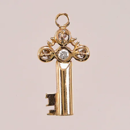Hänge "nyckel", 26x13mm, diamant 1x ca 0,08ct, 3x ca 0,04ct, 18K 4g.