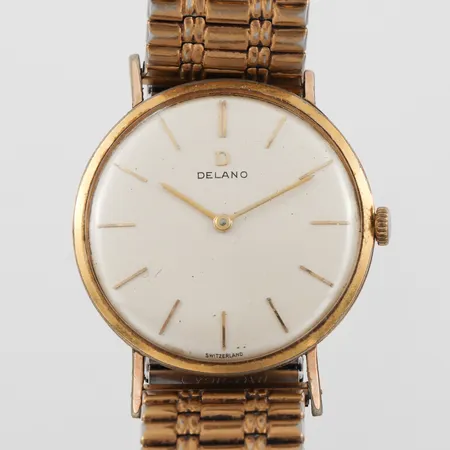 Herrur Delano, diameter ca 34 mm, tickar igång men ej funktionstestad, nummer 2603, kantskada på baksidan.