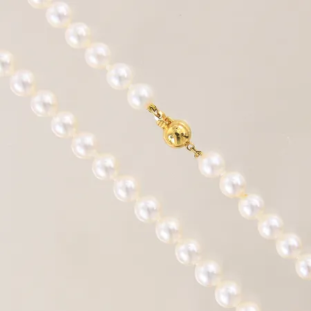 Pärlcollier med odlade saltvattenspärlor, längd: 43cm, bredd: 6,5-7mm, GHA, lås i 18K, bruttovikt: 26,3g. 