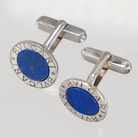 Ett par manschettknappar, Bvlgari, Ø17mm, längd 22mm, blå sten, ytslitage, etui, 925/1000 silver, Vikt: 8,8 g