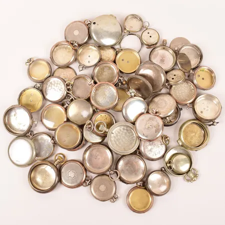 Diverse delar till fickur, 800-925 delar silver, bucklor, skador, gravyrer, vissa med glas, bruttovikt: 1573,6gram