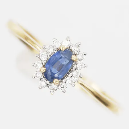 Ring med safir samt diamanter, 14 x ca 0,01ct, stl 18¼, 18K Guld.  Vikt: 1,9 g