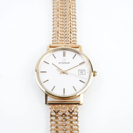 Herrur Eterna 18k m länk 18k, quartz, ca 34mm, 20cm, bredd 15mm, 18k, bruttovikt 46,5gr, batteribyte krävs