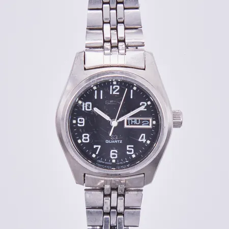 Damur Seiko, Ø 24mm, quartz, stål, datum, ref 780337, serie 4303-0029, går ej batteribyte krävs, repigt glas, länk i stål