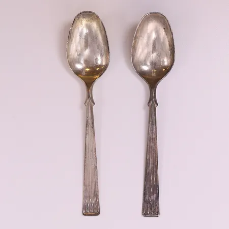 2 Dessertskedar, ca 16cm. 830/1000 silver  Vikt: 44,7 g