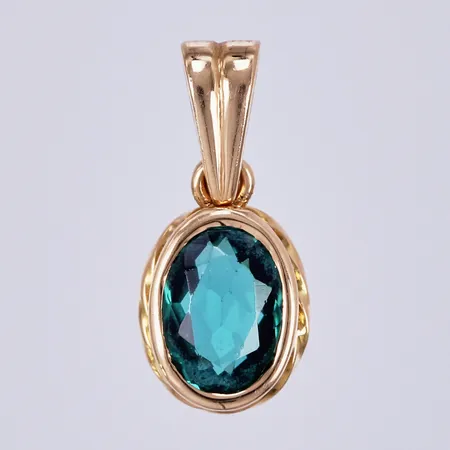 Hänge med grön sten, längd ca 1,7cm, bredd ca 7mm, 18K  Vikt: 1,9 g