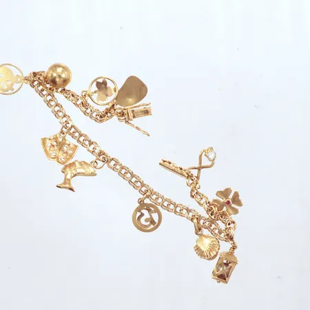 Armband 19cm, Bismarck med 11 berlocker, bredd: 5mm, 18K Vikt: 16,9 g