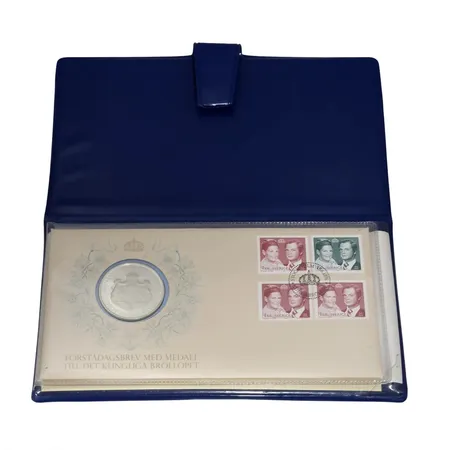 Förstadagsbrev med medalj Kungliga bröllopet i storkyrkan den 19 juni 1976, förvaras i tillhörande etui (21X12 cm), utgiven av Franklin Mint AB, fint skick utan anmärkning