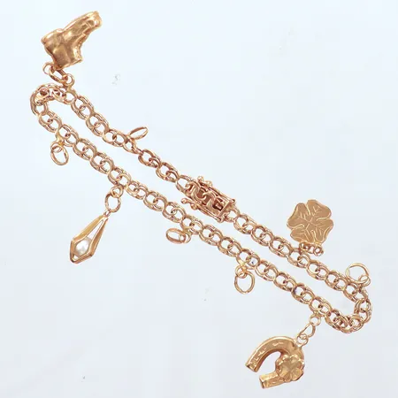 Armband Bismarck med 4 berlocker, tomma öglor och defekt länk, 18cm, 18K Vikt: 7,4 g