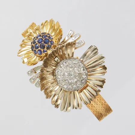 Damur, Smyckesklocka med blommor, gammalslipade diamanter 24 x ca 0,06-0,16ct + 12 x ca 0,01ct, blå stenar, säkerhetskedja, lös del, längd ca 16cm, 18K, 63,9g.