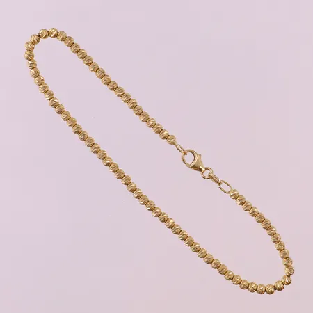 Armband med kulor, längd 18cm, bredd 2,5mm, 18K.  Vikt: 4,7 g