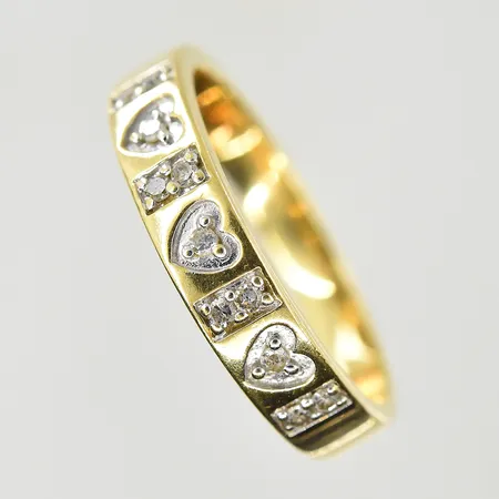 Ring med diamanter 0,10ctv, stl 17, bredd 3-4 mm, 18K. Vikt: 2,9 g
