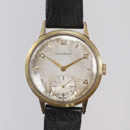 Herrur Movado 14K Ø33mm, manuell uppdragning, fläckig urtavla, defekt läderband, gravyr, 1950-tal bruttovikt 29,8g