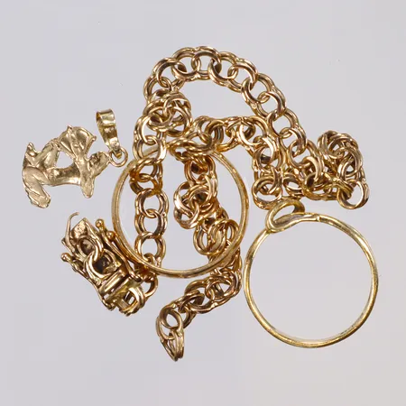 Diverse guld, defekt, delvis gravyr 18K Vikt: 10,9 g