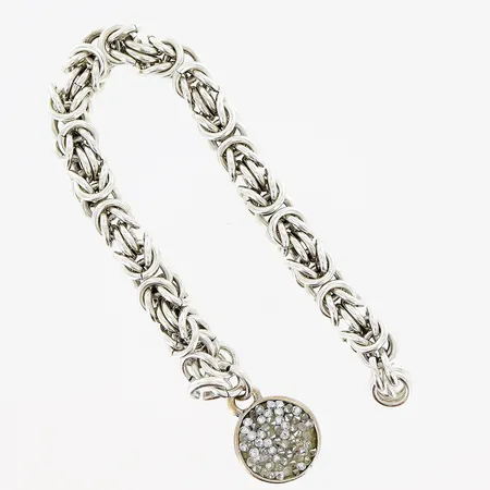 Armband Kejsarmodell, lås saknas, påsittande berlock i metall, defekter, bruttovikt 49,7gram, otydlig stämpel, silver. Vikt: 49,7 g