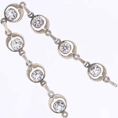 Armband med vita stenar, 18cm, bredd 13mm, tilv. Karl Laine, Finland, defekt saknar lås, silver 925/1000 Vikt: 14,6 g