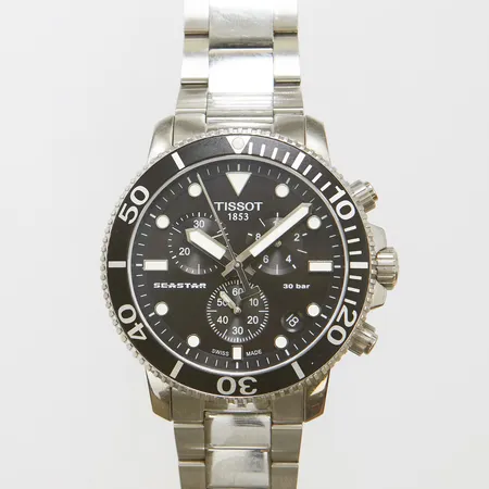 Herrur Tissot Seastar, quartz, stål, datum, krongraf, Ø45,5mm, refnr: T120417A, serienr: YK1 PZG 0TJ, stållänk, viklås, mindre repor på länk, inga tillbehör. 